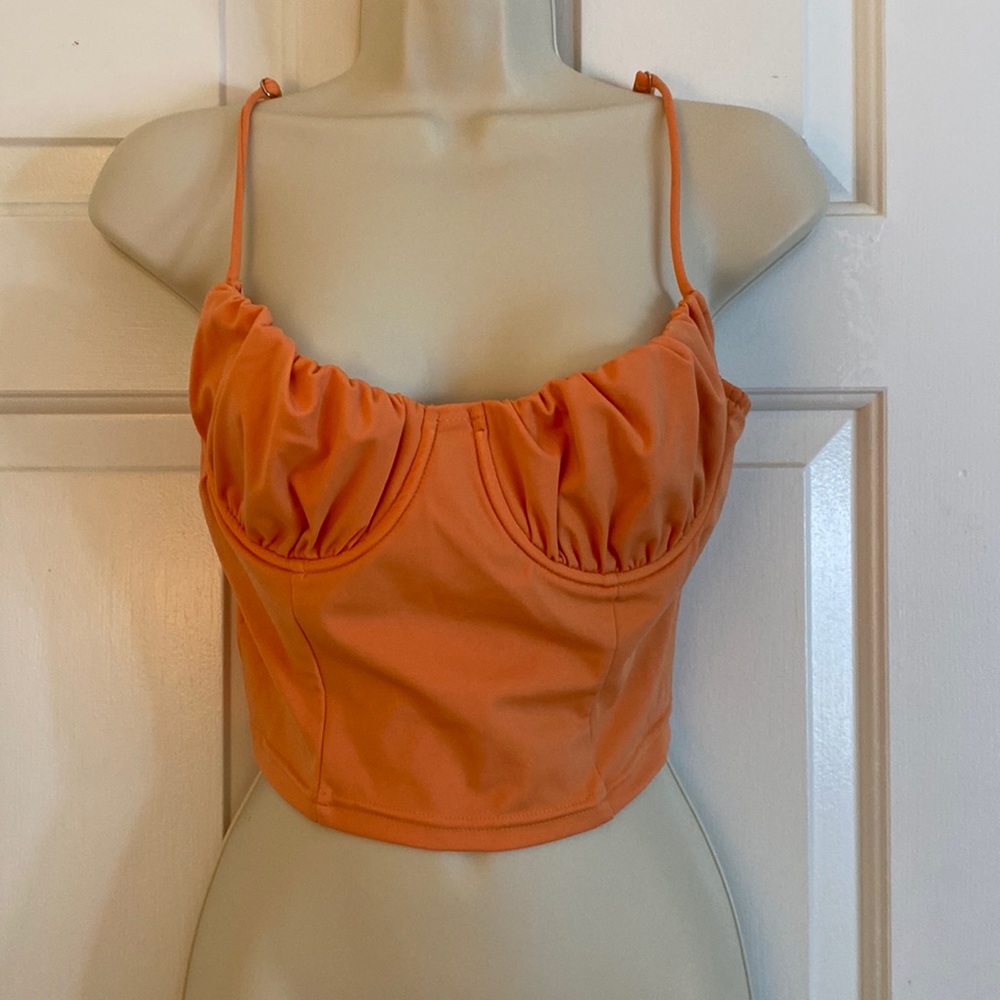 Bright orange cropped top